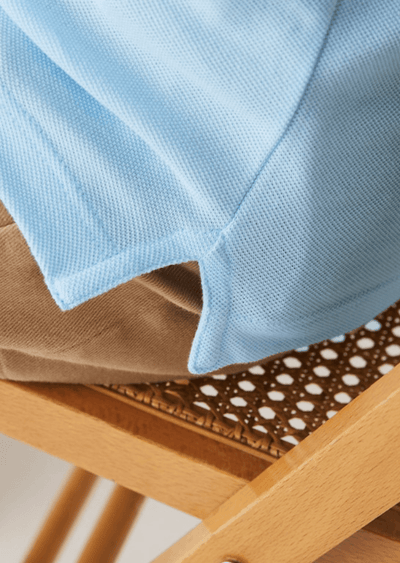 Polo Lacoste ajusté bleu clair
