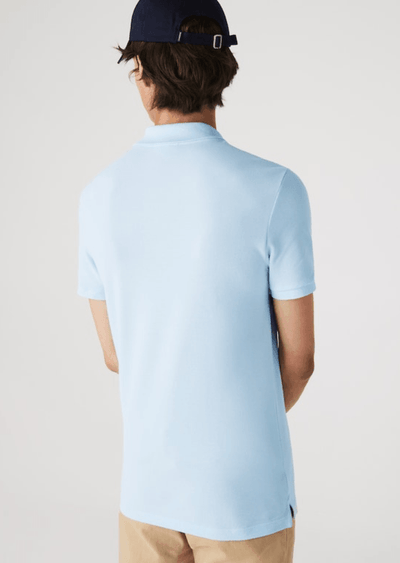 Polo Lacoste ajusté bleu clair