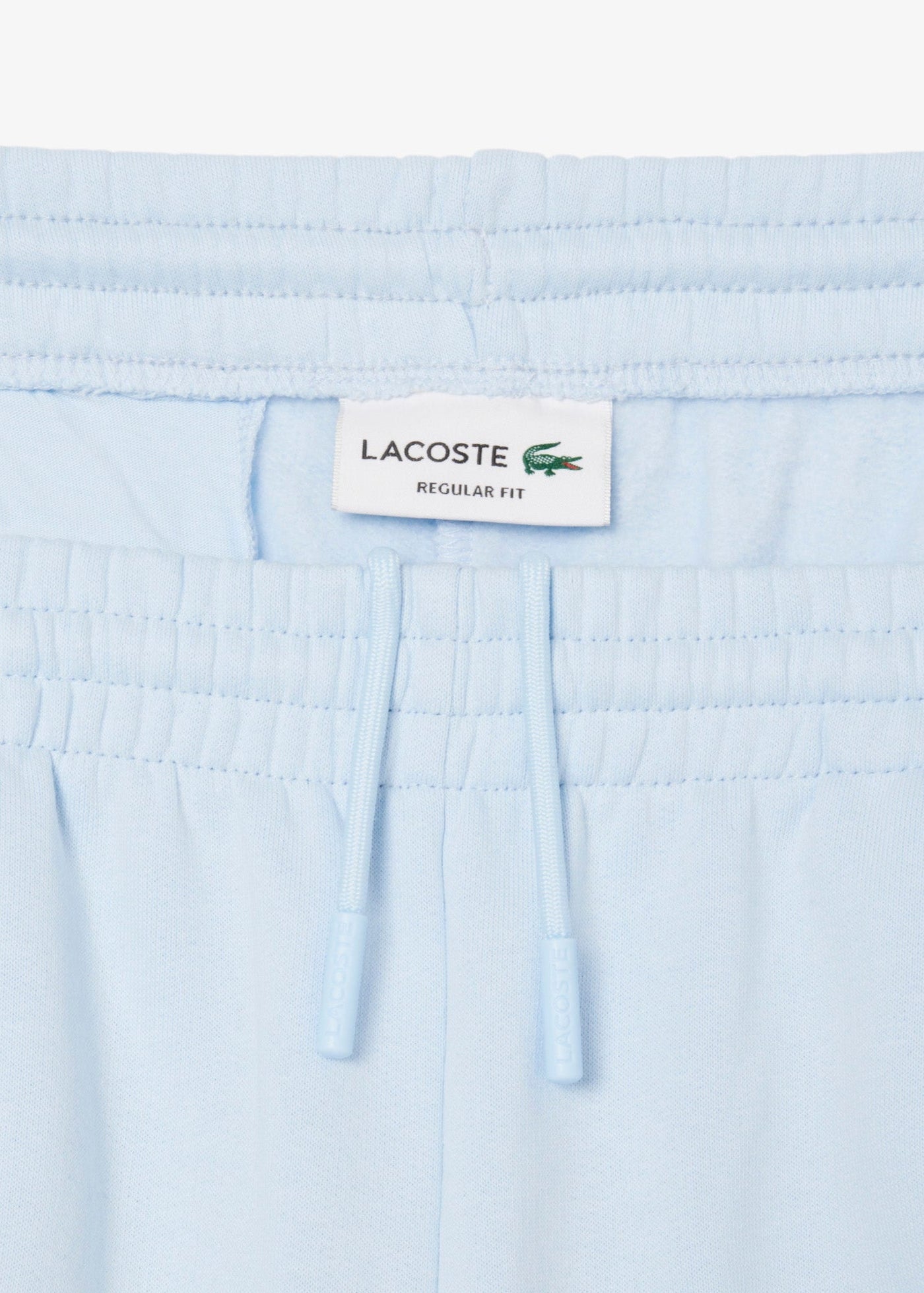 Short Lacoste bleu en molleton